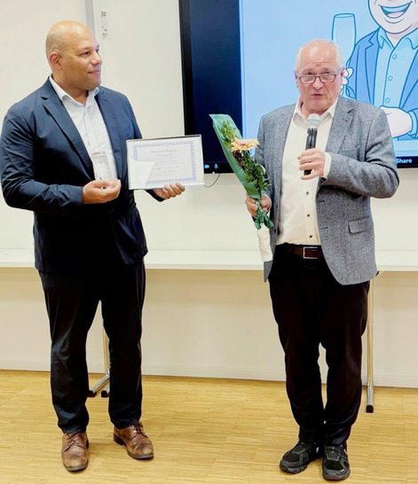 Herr Patrick Aligbe und Prof. Dr. Stephan Letzel bei der Übergabe des Heinrich-Dupuis-Preises